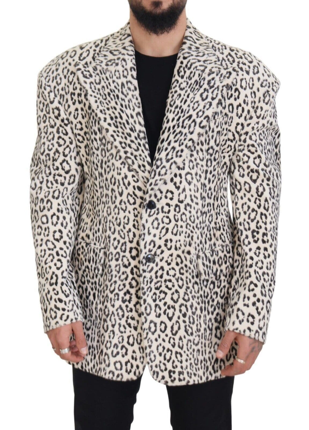 Veste blazer Dolce & Gabbana blanc à motif léopard, coupe simple et boutonnage simple, portée élégante et tendance.