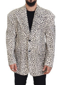 Veste blazer Dolce & Gabbana blanc à motif léopard, coupe simple et boutonnage simple, portée élégante et tendance.