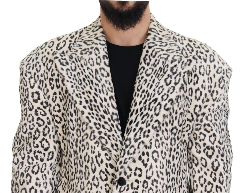 Manteau blazer blanc à motif léopard Dolce & Gabbana, coupe simple et élégante, en tissu léger, vue de face.