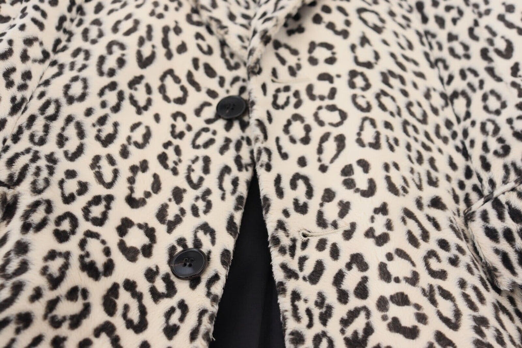 Manteau blazer blanc à motif léopard Dolce & Gabbana à double boutonnage, style élégant et sophistiqué.