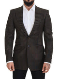 Blazer Dolce & Gabbana à rayures noires et brunes, à un bouton, coupe classique, porté sur un mannequin.