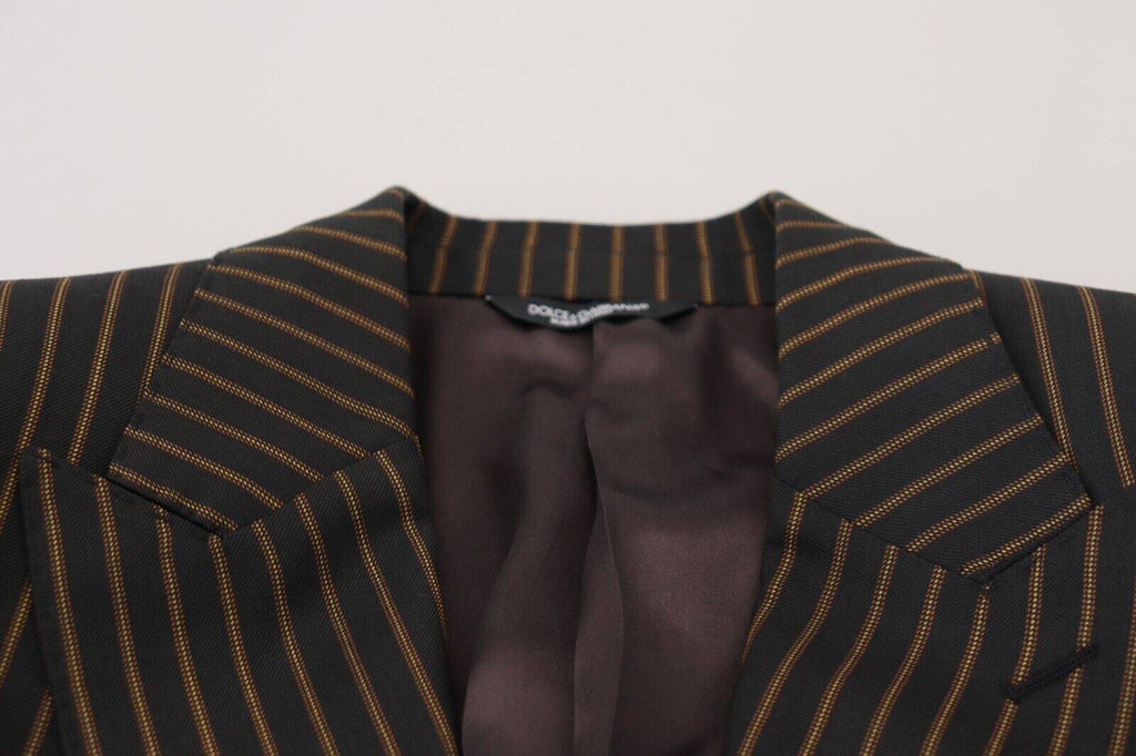 Blazer noir et marron à rayures Dolce & Gabbana, à un seul bouton, en tissu élégant, porté sur un mannequin.