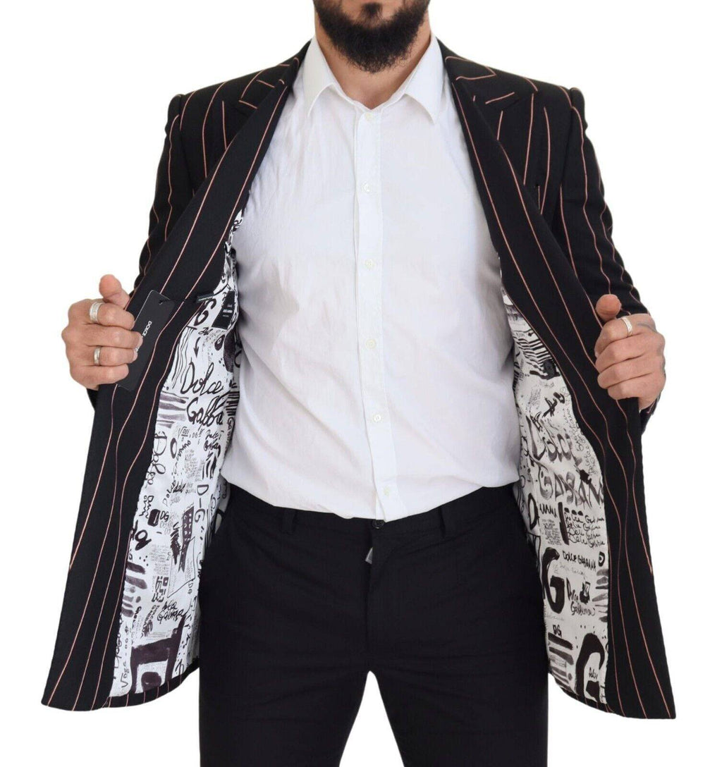 Blazer noir à rayures Dolce & Gabbana en viscose à double boutonnage, élégant et sophistiqué, porté sur un mannequin.