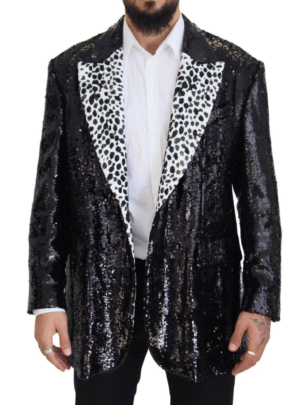 Veste en nylon noir Dolce & Gabbana avec motif vache à sequins, blazer élégant et tendance avec détails brillants.