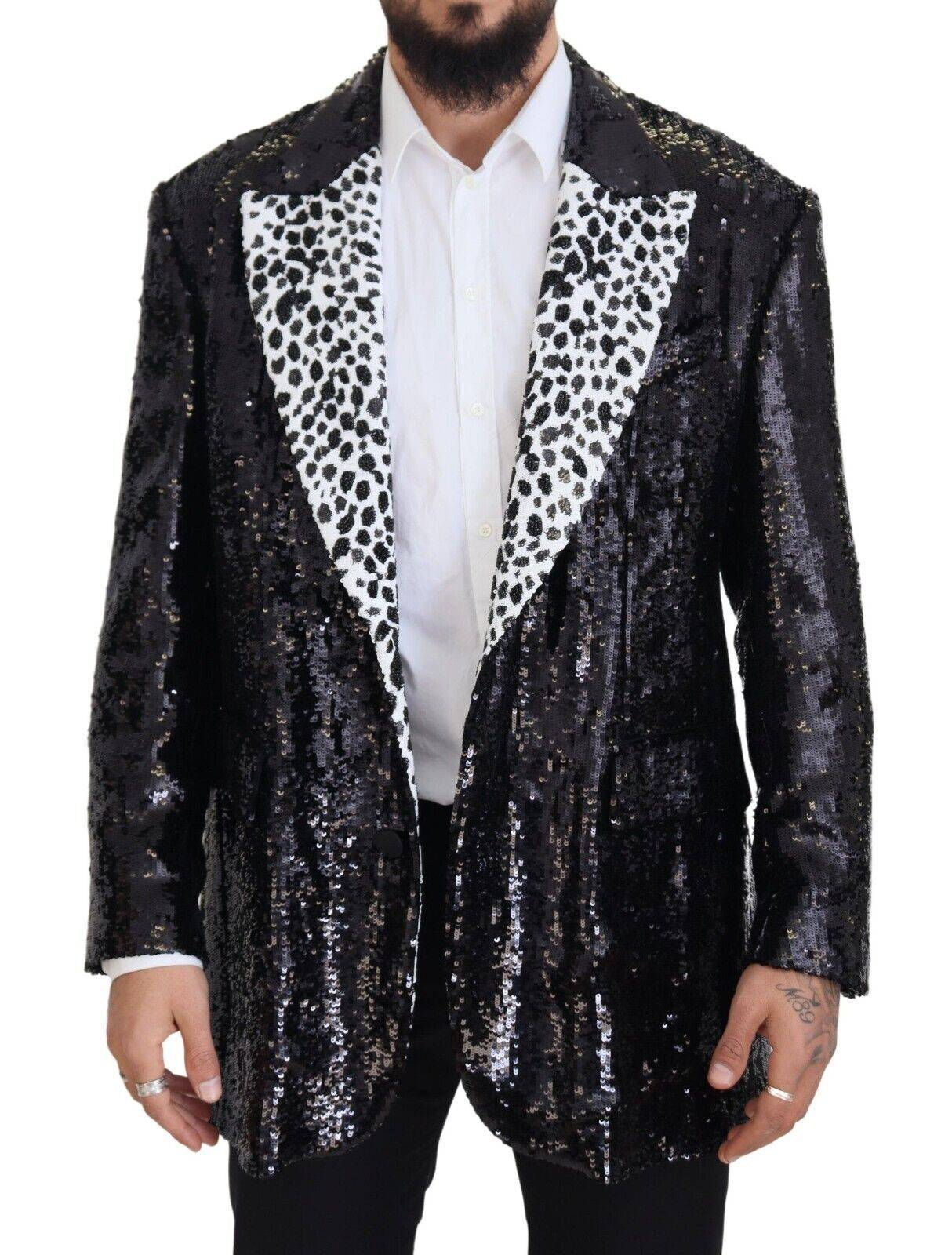 Veste en nylon noir Dolce & Gabbana avec motif vache à sequins, blazer élégant et tendance avec détails brillants.