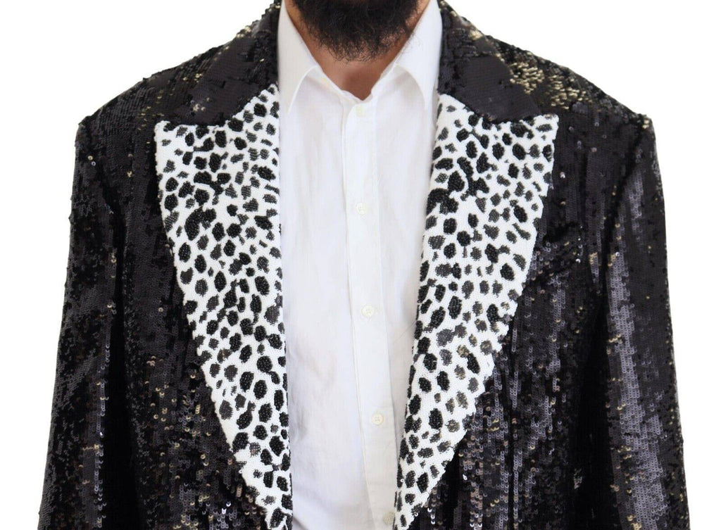 Veste en nylon noir Dolce & Gabbana avec motif vache à sequins, blazer élégant avec détails brillants et design tendance.