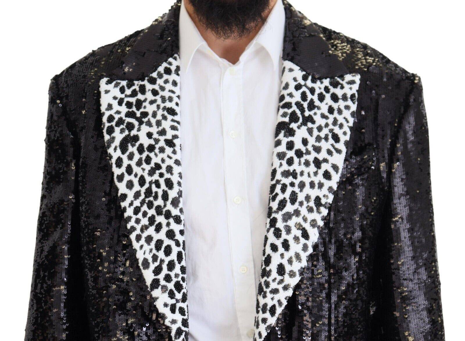 Veste en nylon noir Dolce & Gabbana avec motif vache à sequins, blazer élégant avec détails brillants et design tendance.