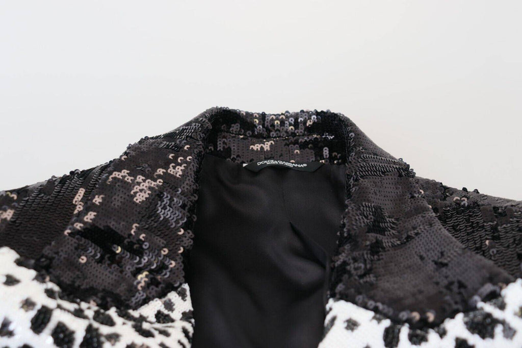 Blazer noir Dolce & Gabbana en nylon avec motif vache à sequins noirs, style élégant et tendance.