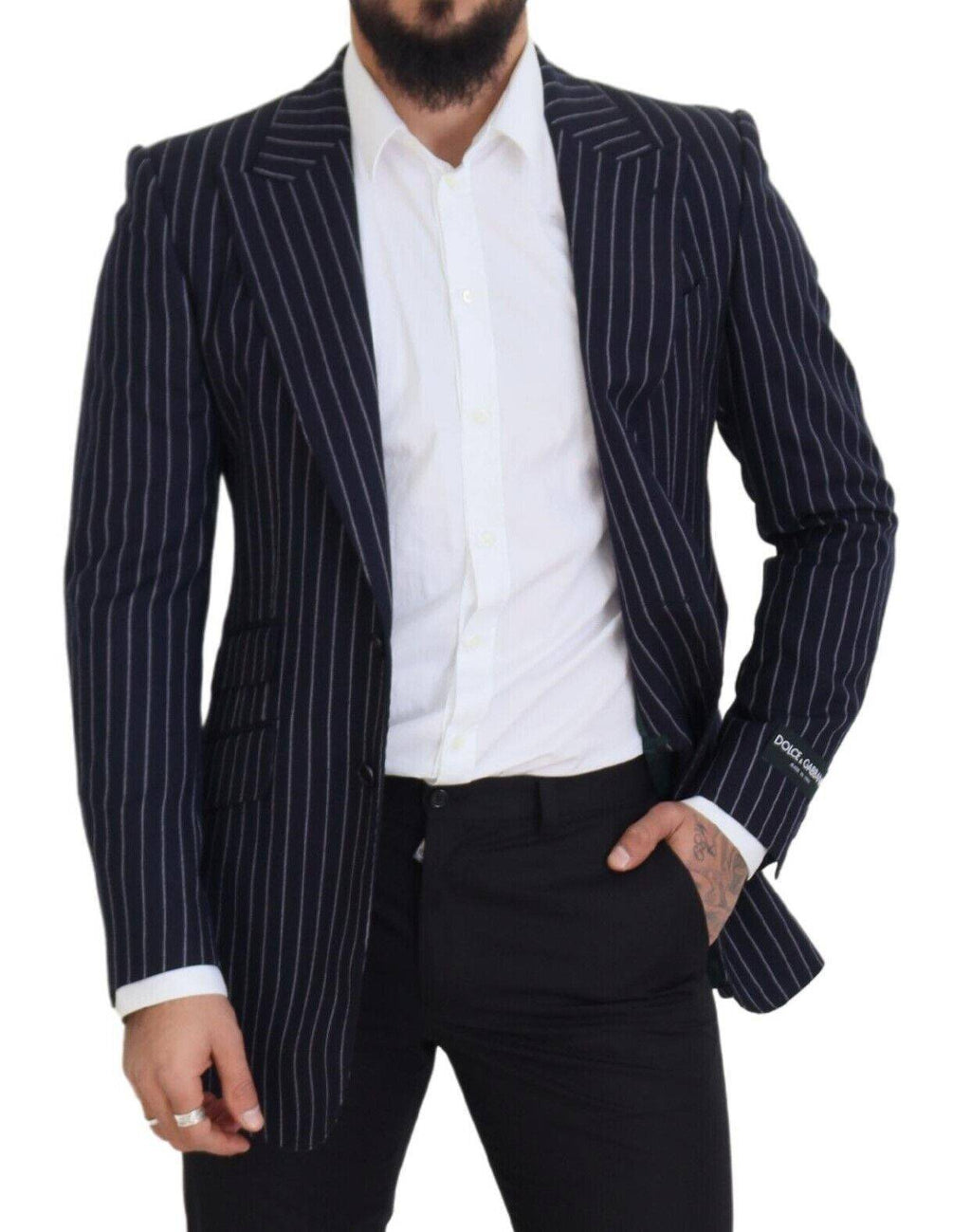 Veste blazer en laine à rayures bleues foncées de Dolce & Gabbana, coupe simple avec col et boutons sur le devant.