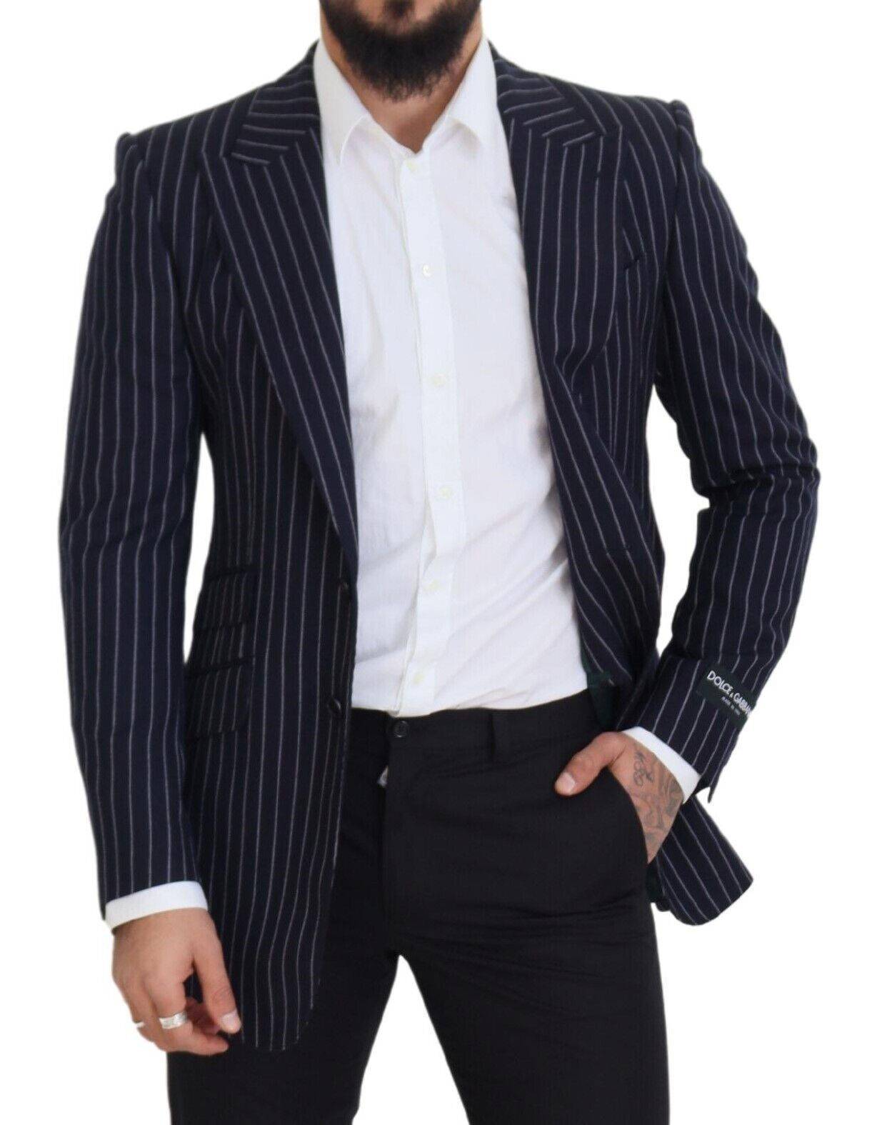 Veste blazer en laine à rayures bleues foncées de Dolce & Gabbana, coupe simple avec col et boutons sur le devant.