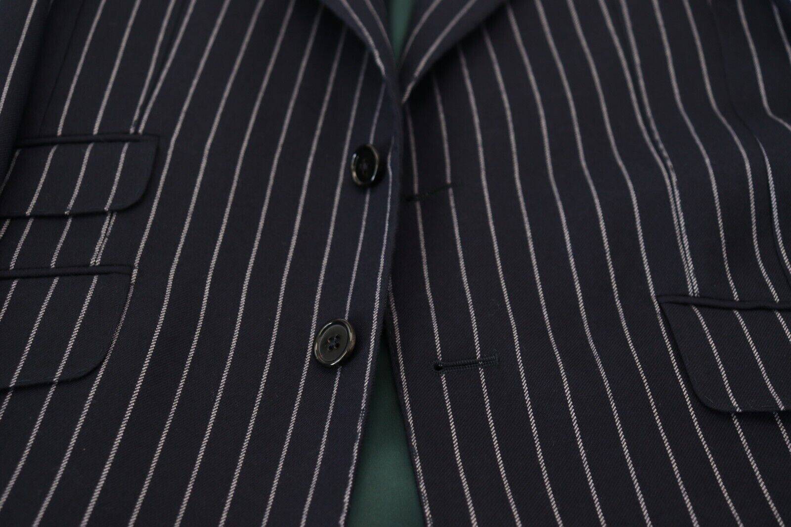 Blazer en laine à rayures bleues foncées de Dolce & Gabbana, à col à revers simple et coupe élégante.