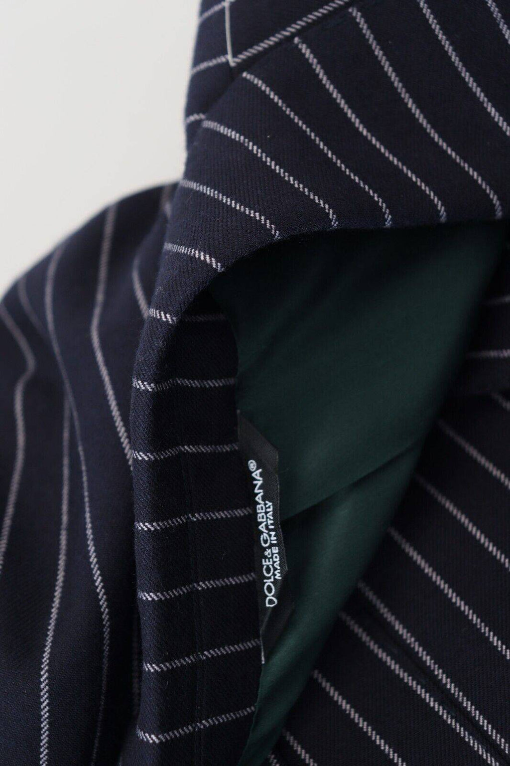 Veste en laine à rayures bleues foncées de Dolce & Gabbana, blazer à boutonnière simple, coupe élégante.