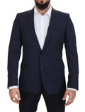 Veste blazer en laine bleu foncé Dolce & Gabbana à un bouton, coupe classique et élégante, portée pour un style sophistiqué.