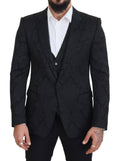 Costume deux pièces Dolce & Gabbana en brocart noir à motifs floraux, élégant et sophistiqué.