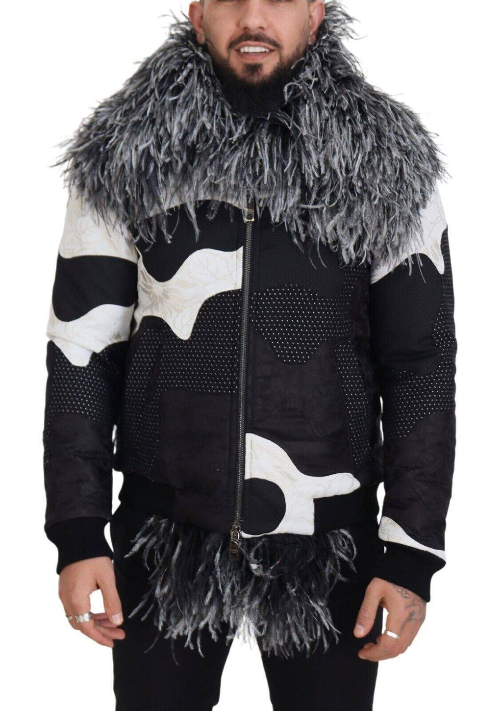 Veste en shearling noir et blanc Dolce & Gabbana avec fermeture éclair complète, doublée en fourrure, pour un style élégant et chaud.