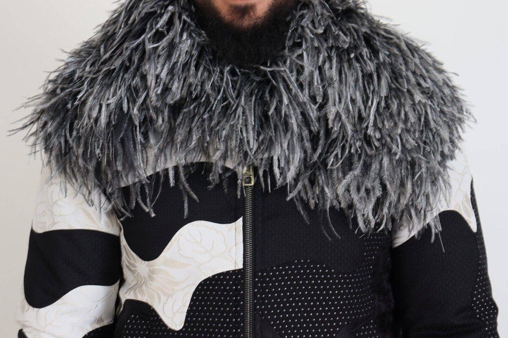 Veste en shearling noir et blanc Dolce & Gabbana avec fermeture éclair complète, look élégant et chaud.