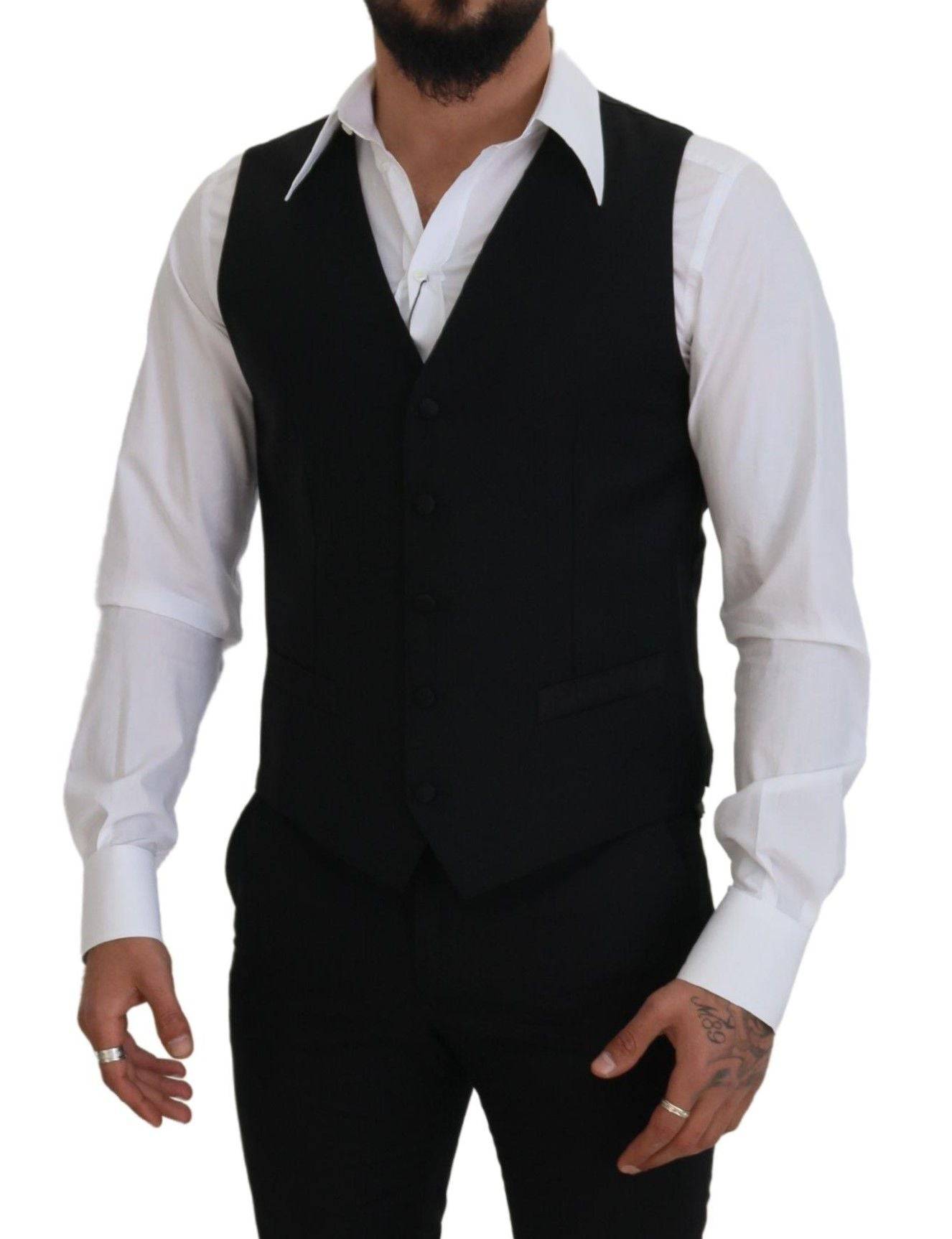 Gilet de costume noir en laine vierge de Dolce & Gabbana, élégant et formel, porté sur un mannequin.