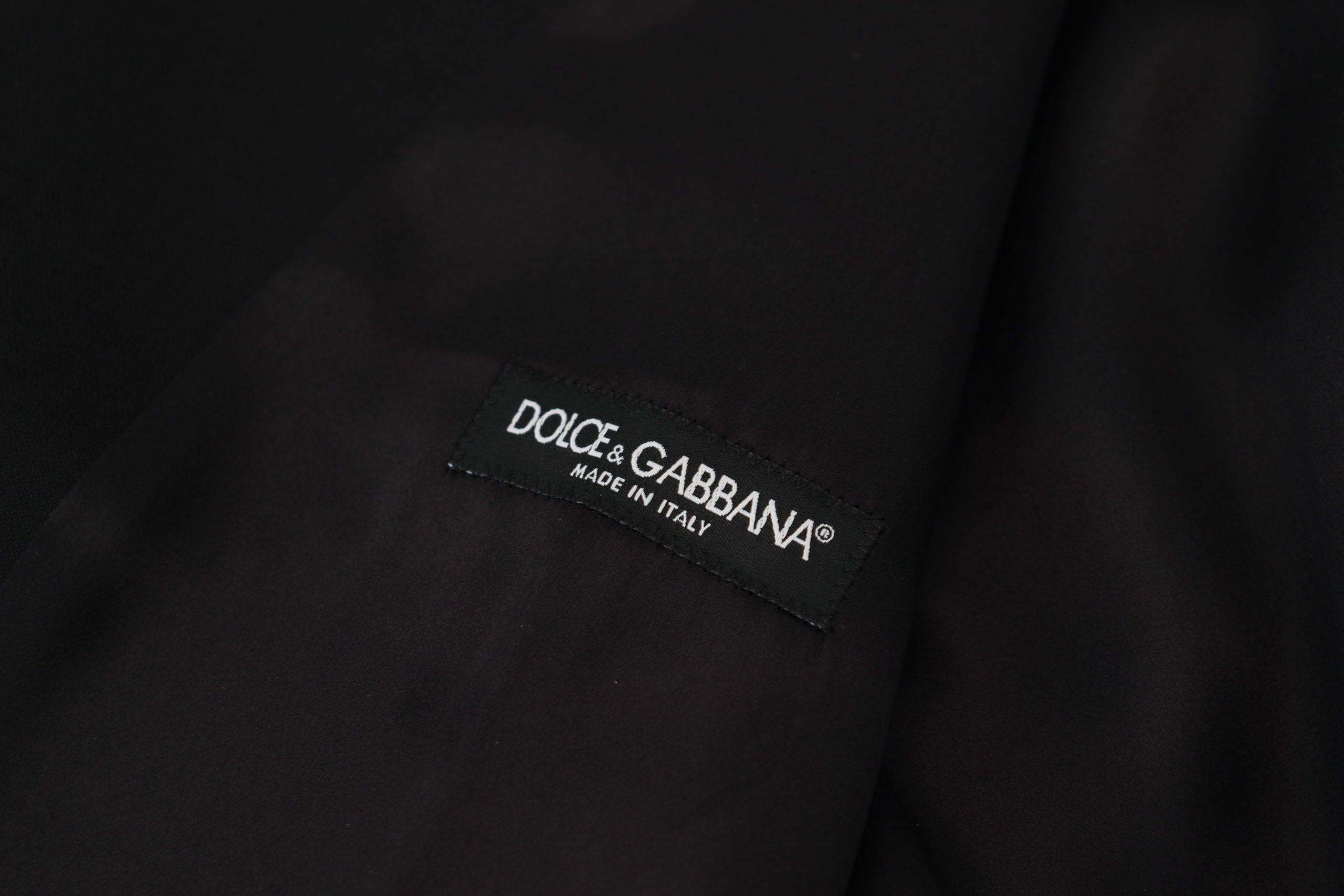 Gilet de costume noir en laine vierge de Dolce & Gabbana, veste formelle élégante pour homme.
