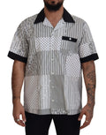 Chemise Dolce & Gabbana blanche et noire à motifs, boutonnière, en coton, visible en gros plan.