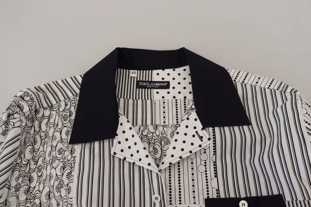 Chemise blanche et noire à motifs de Dolce & Gabbana avec boutons, style élégant et moderne.