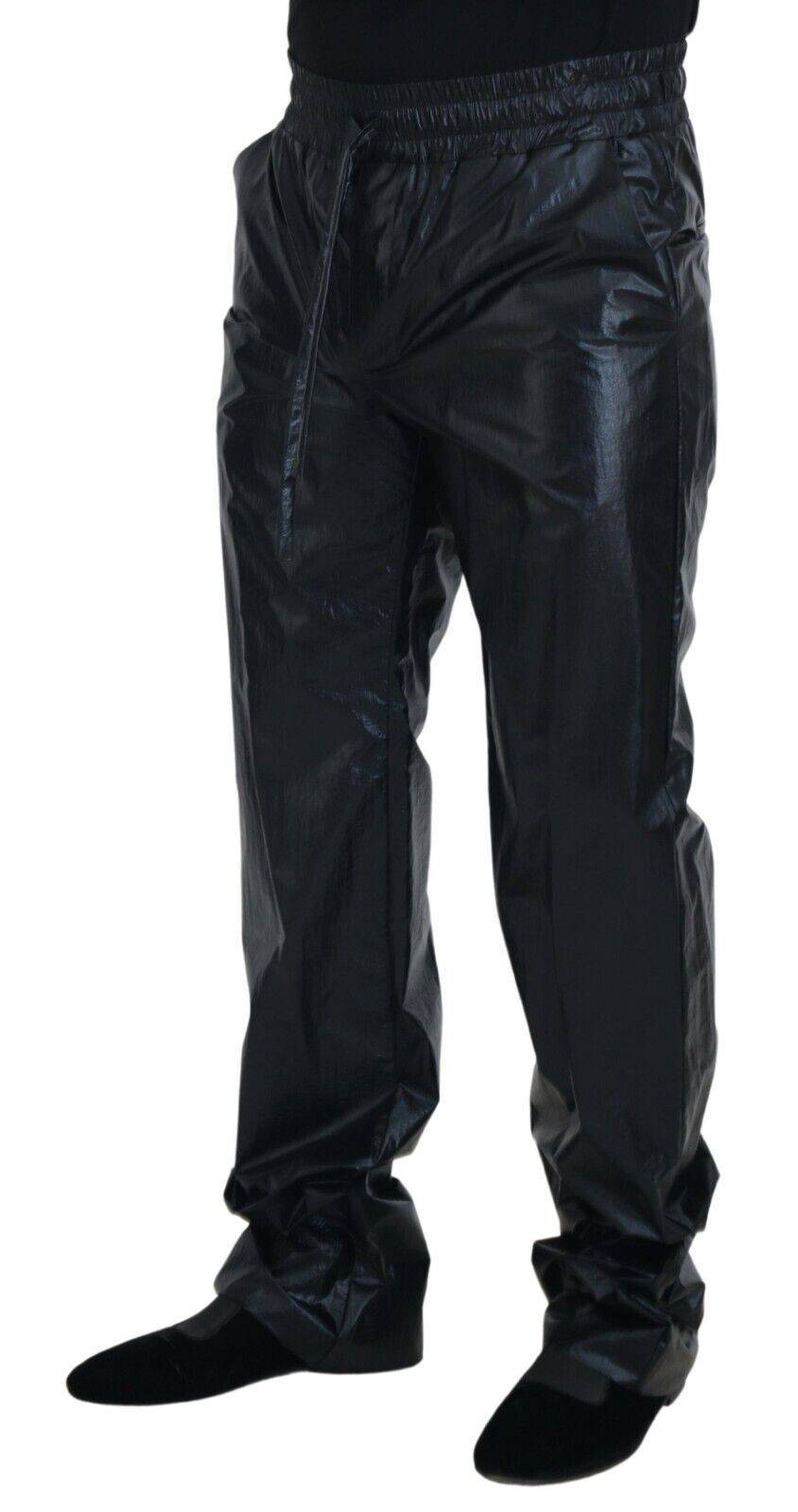 Pantalon en nylon noir Dolce & Gabbana à cordon de serrage, avec finition brillante et style élégant.