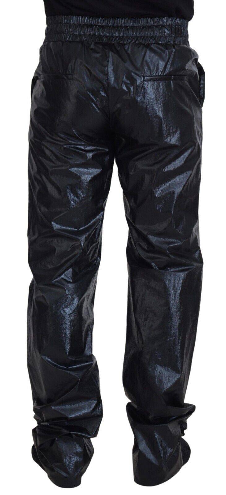 Pantalon noir en nylon Dolce & Gabbana à cordon de serrage, style brillant et moderne, vue de face.