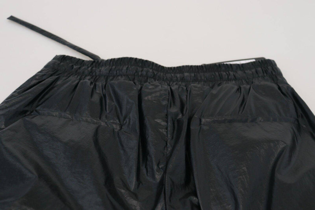 Pantalon en nylon noir Dolce & Gabbana à cordon de serrage, pantalon brillant et élégant pour homme.