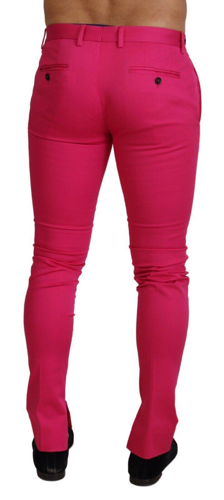 Pantalons taille haute rose Dolce & Gabbana avec fermeture éclair et boucle à la taille, mode élégante et sophistiquée.