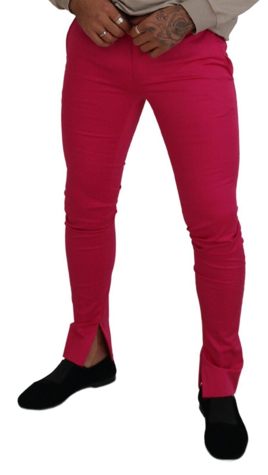 Pantalon taille haute Dolce & Gabbana rose avec fermeture éclair et boucle à la taille, en tissu élégant.