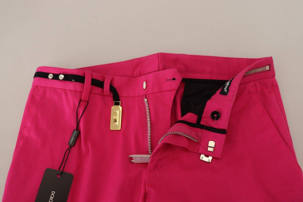 Pantalon taille haute rose Dolce & Gabbana avec boucle à fermeture éclair, style élégant et tendance.