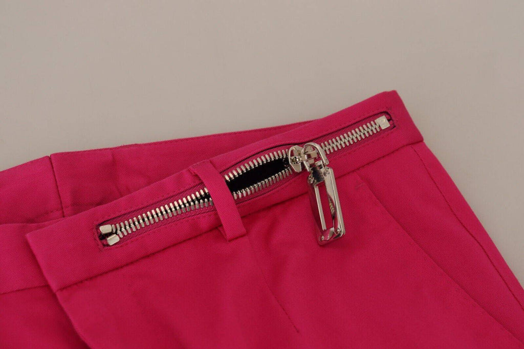Pantalons taille haute Dolce & Gabbana roses roses avec fermeture éclair et boucle à la taille, en tissu rose clair.