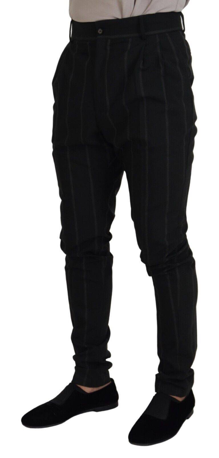 Pantalon homme Dolce & Gabbana en coton noir à rayures, style élégant et moderne, visible en détail sur l'image.