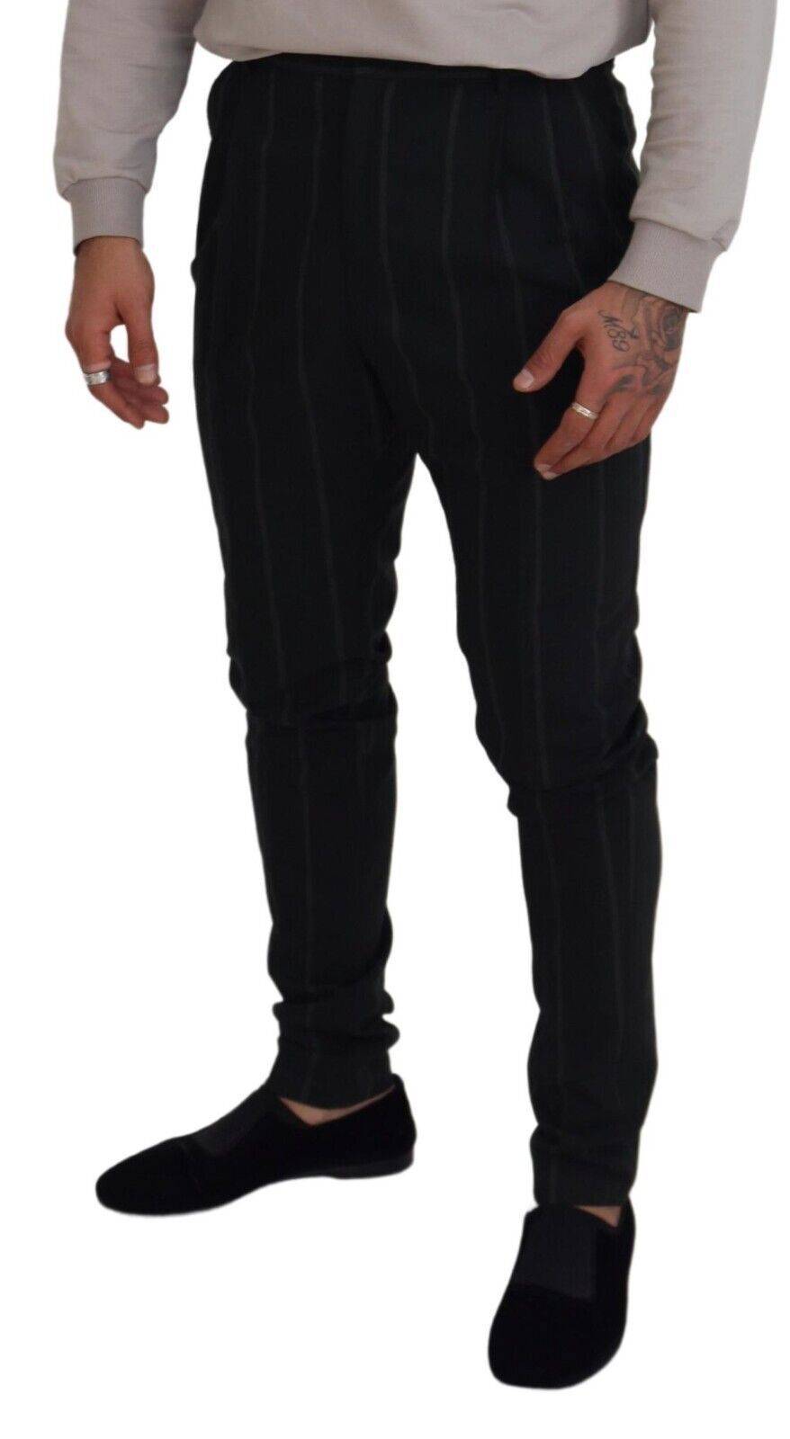 Pantalon homme noir à rayures Dolce & Gabbana en coton, style élégant et décontracté, visible avec poches et fermeture éclair.