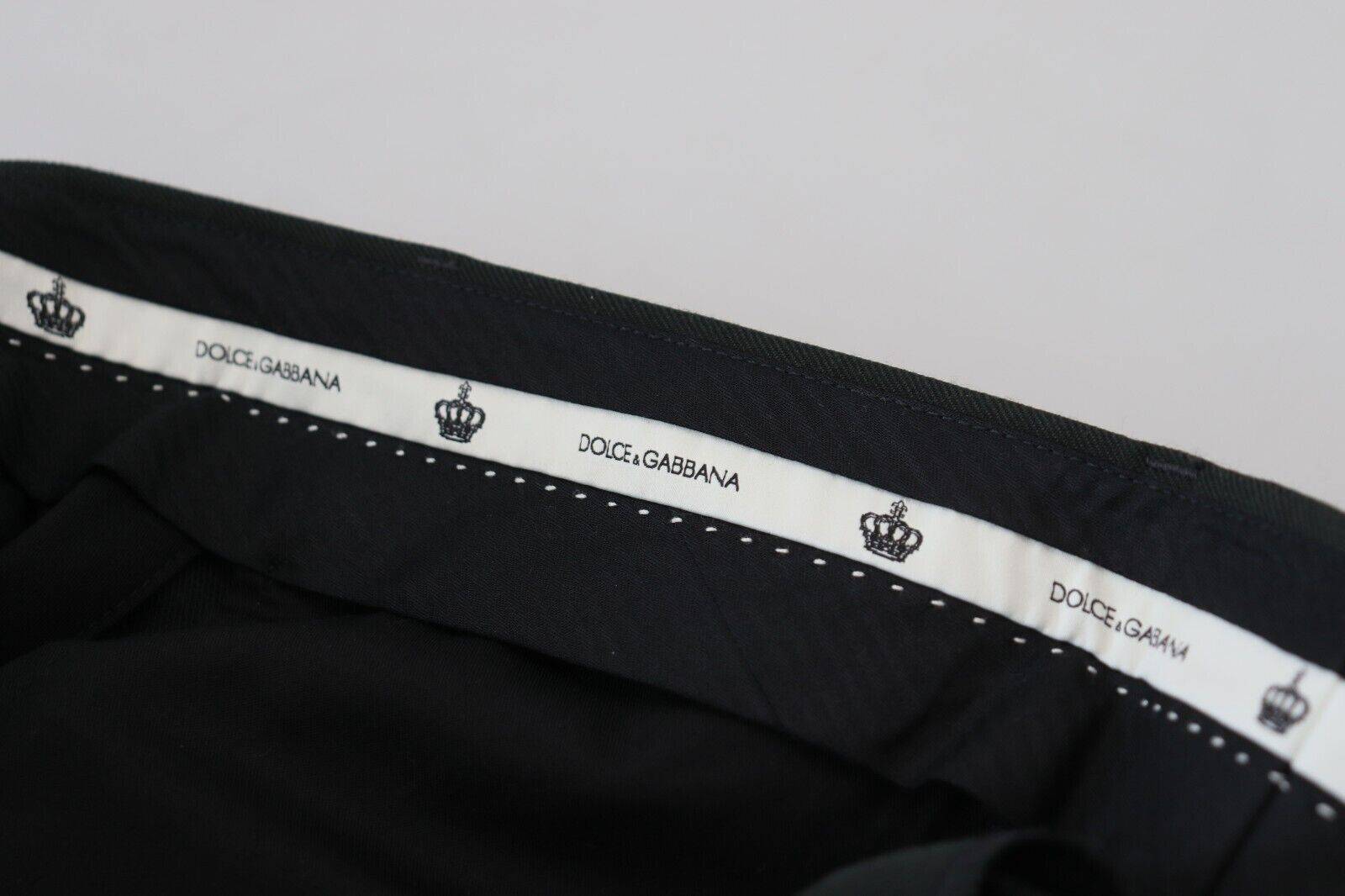 Pantalon homme Dolce & Gabbana noir à rayures en coton, élégant et confortable, visible en détail sur l'image.