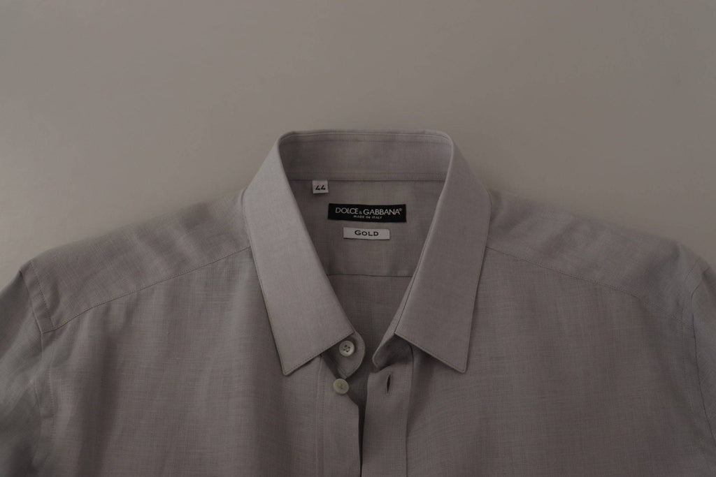 Chemise longue Dolce & Gabbana en lin gris à manches longues et détail doré pour une tenue formelle élégante.