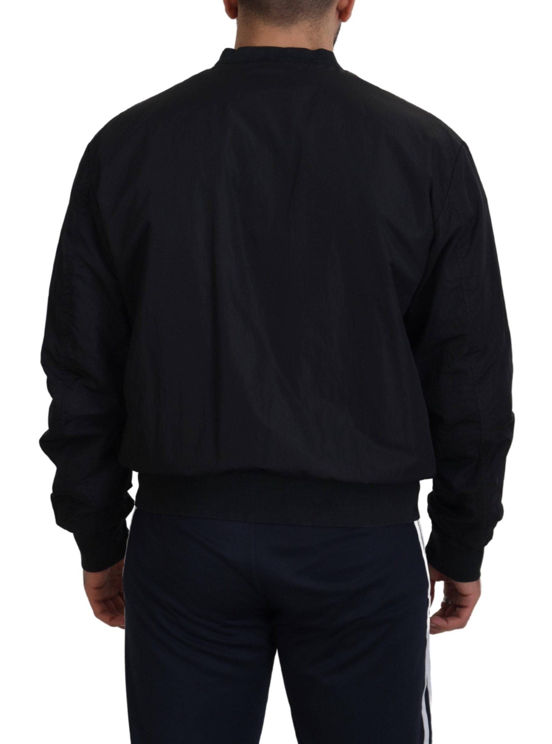 Veste bomber en nylon noir Dolce & Gabbana avec logo, fermeture éclair et design élégant.