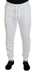 Pantalon de sport blanc Dolce & Gabbana en coton avec logo, style décontracté et confortable, visible en détail dans l'image.