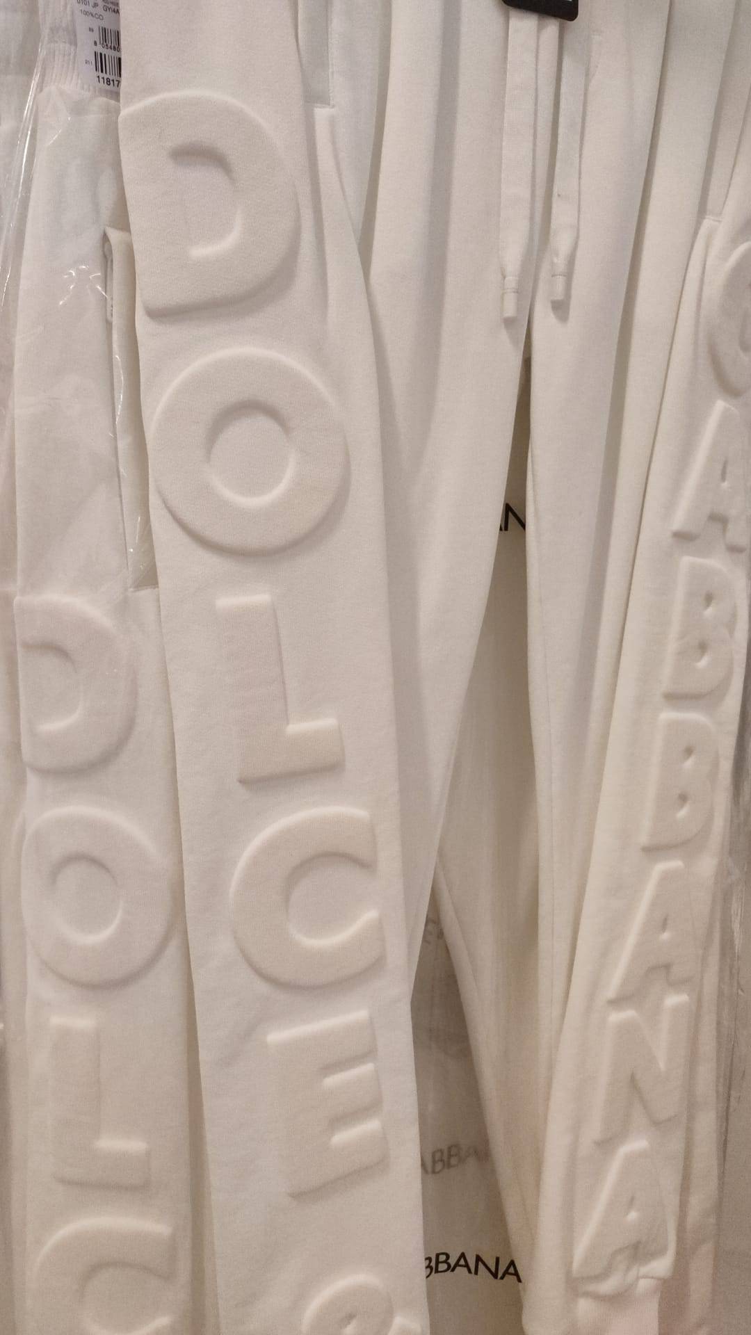 Pantalon de sport blanc Dolce & Gabbana en coton avec logo, veste décontractée, vue de face.