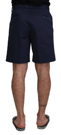 Shorts décontractés en coton stretch bleus Dolce & Gabbana, chino slim pour homme, détails modernes, look élégant et confortable.