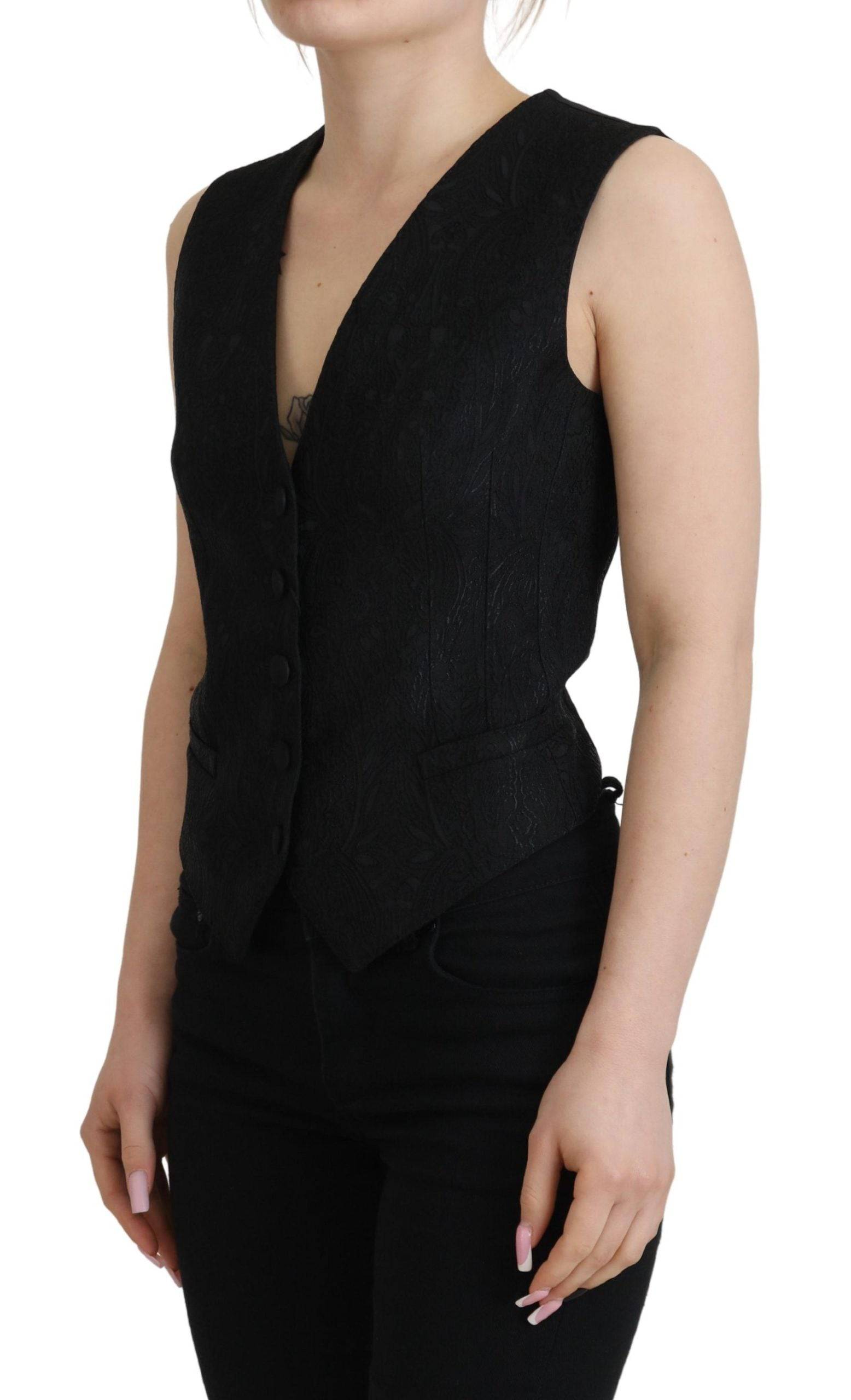 Veste sans manches en brocart noir Dolce & Gabbana avec boutons, vue détaillée du devant.