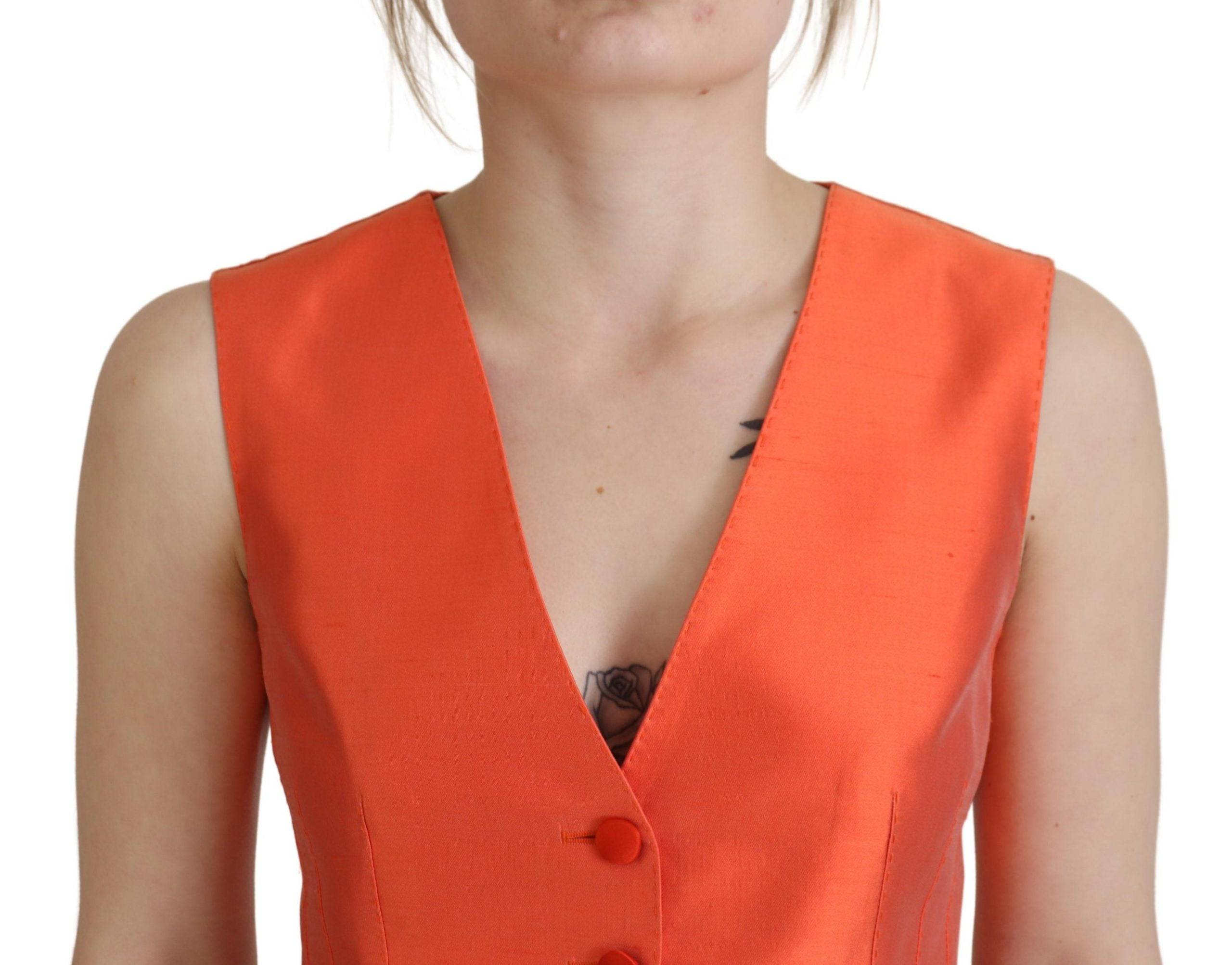 Gilet sans manches orange Dolce & Gabbana, coupe cropped, veste cintrée élégante, en tissu léger.