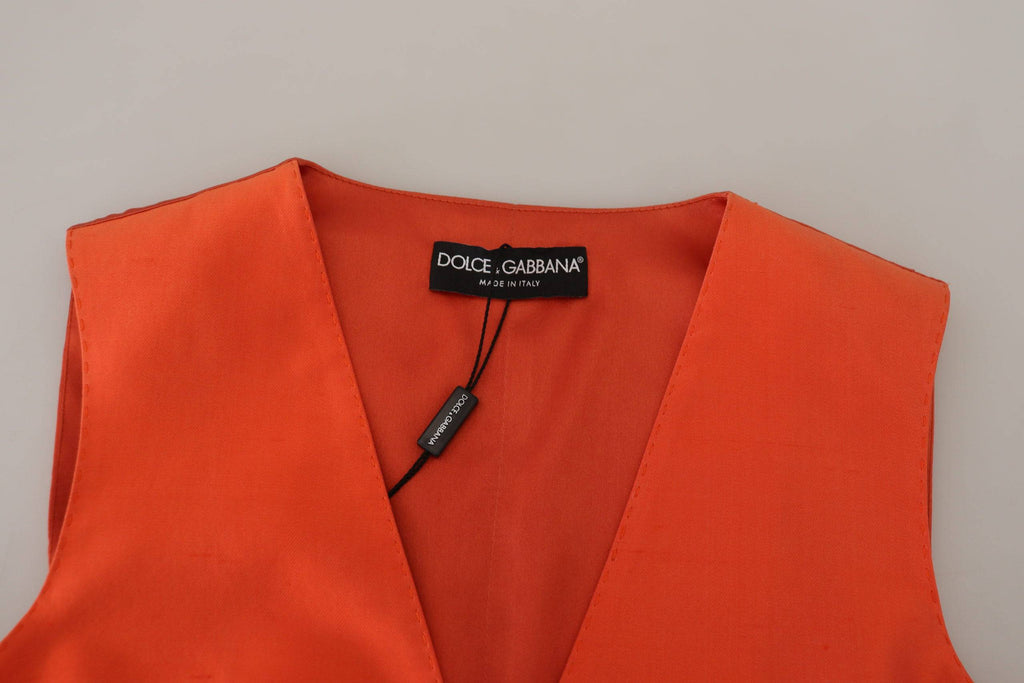 Gilet sans manches orange Dolce & Gabbana, coupe courte, veste cintrée, détail élégant, mode féminine sophistiquée