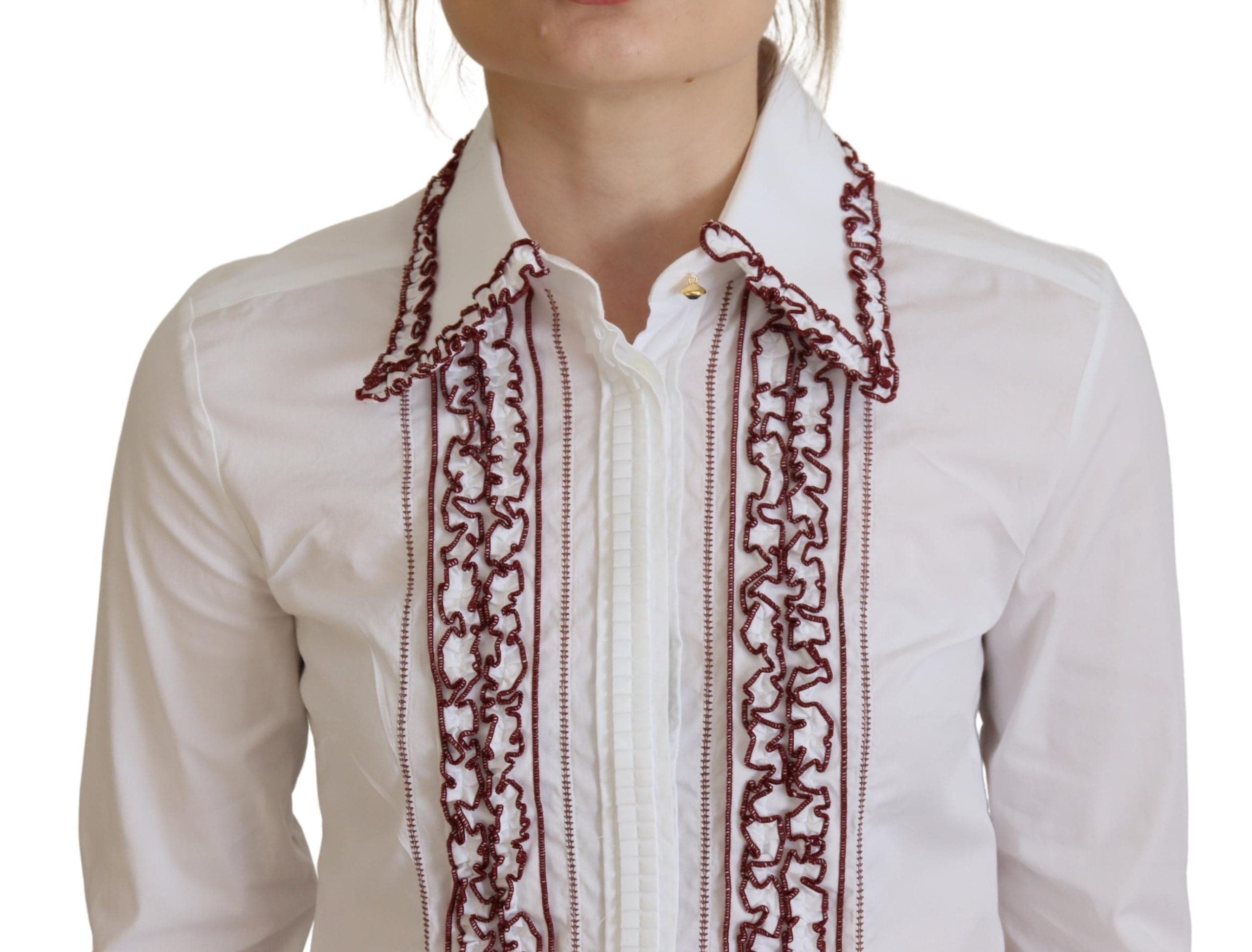 Chemise blanche en dentelle Dolce & Gabbana avec manches longues et col à volants, détails élégants et féminins.