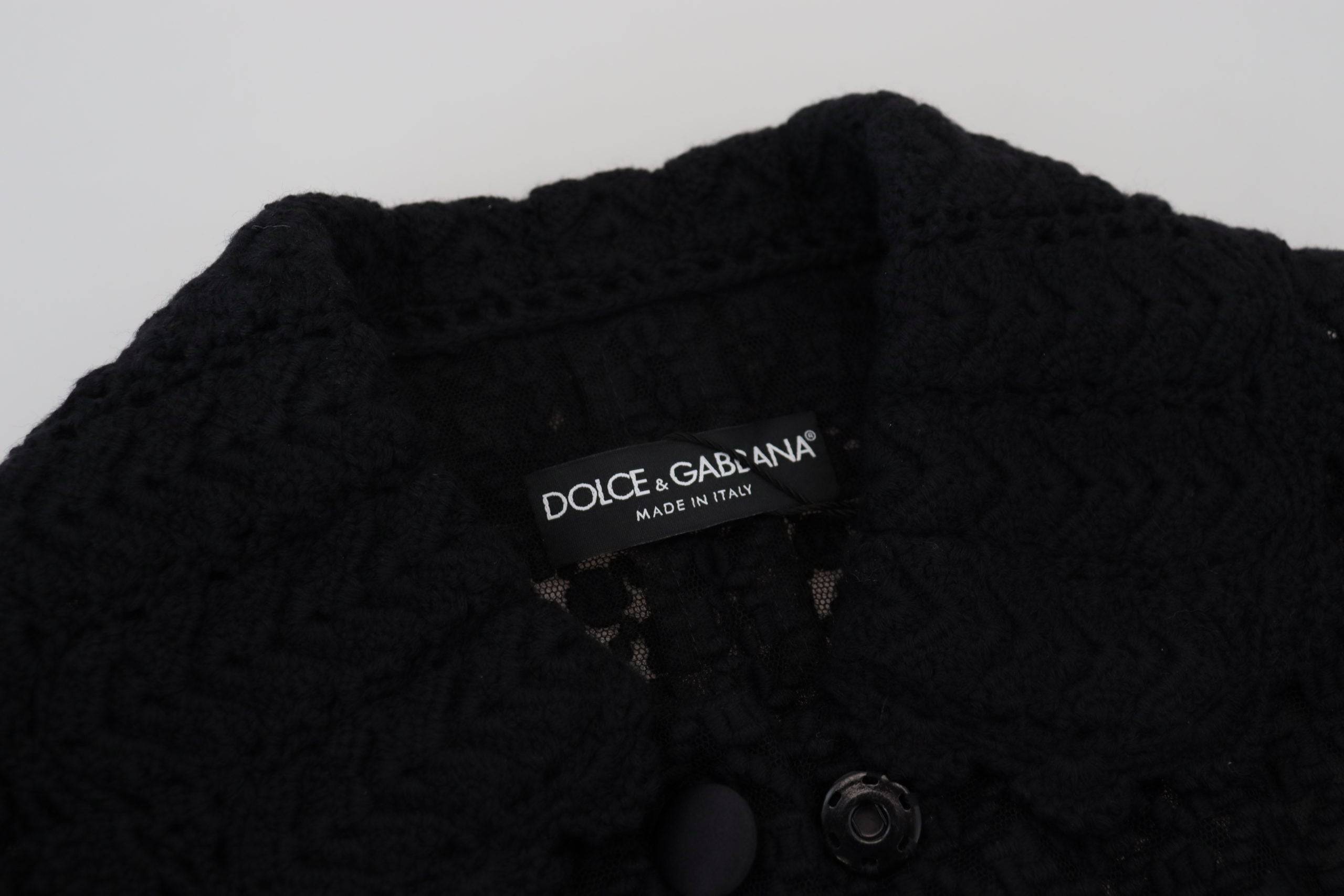 Veste en laine noire Dolce & Gabbana avec col à boutons, coupe élégante et finition tricotée.