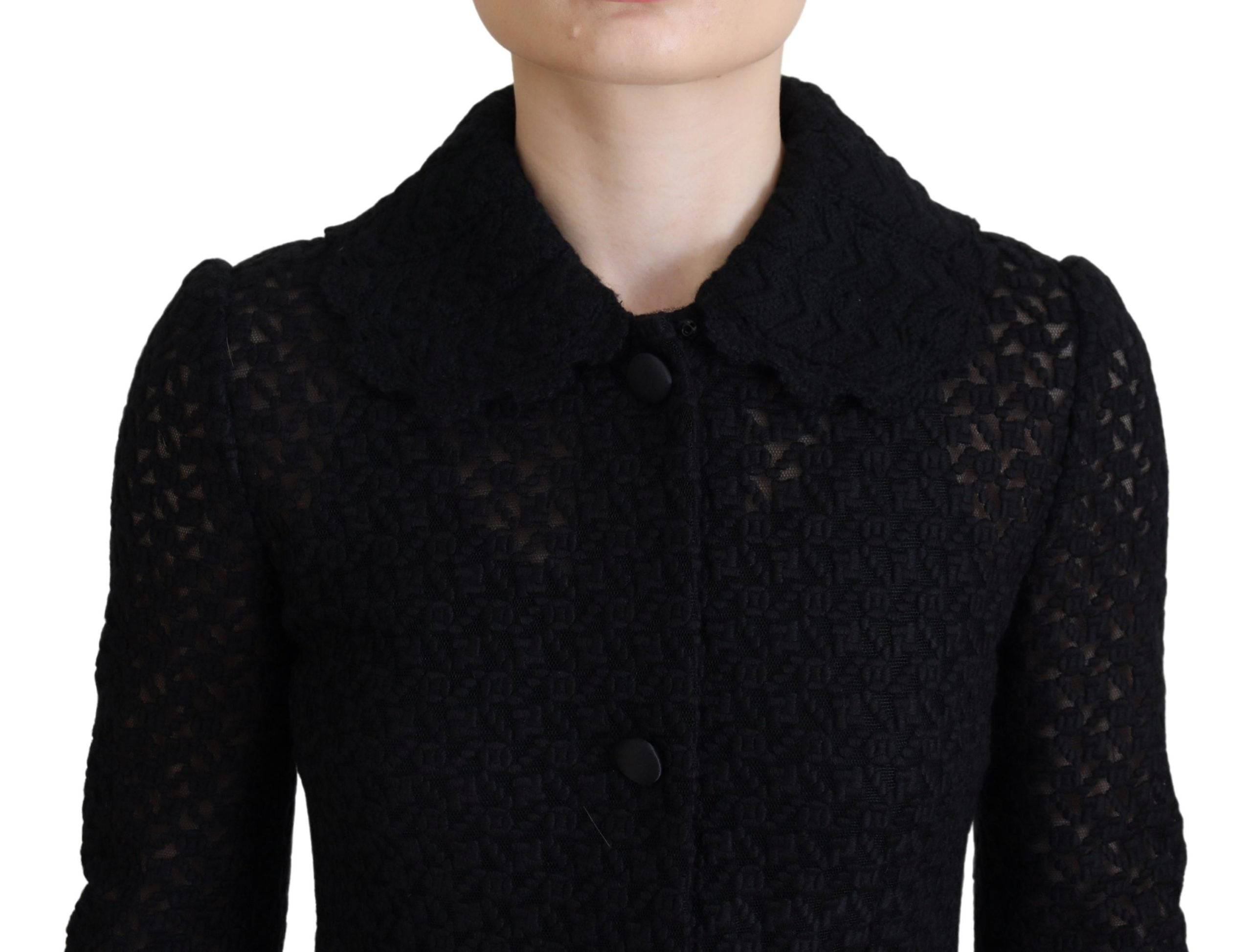 Blazer long noir en coton Dolce & Gabbana avec boutons, élégant et classique, porté sur un mannequin.
