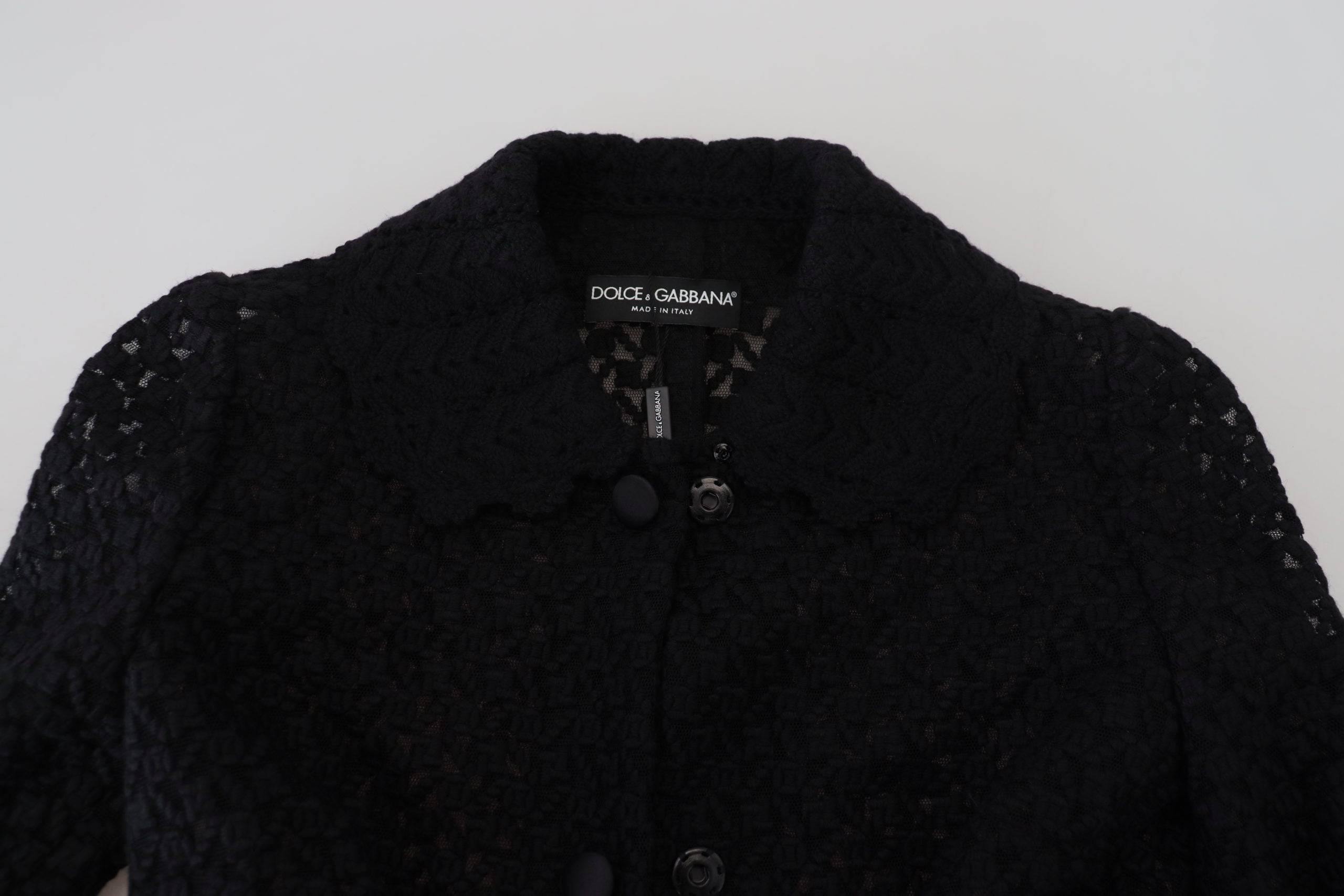 Veste blazer noire à boutons Dolce & Gabbana en coton, long et élégante, portée ouverte, vue de face.