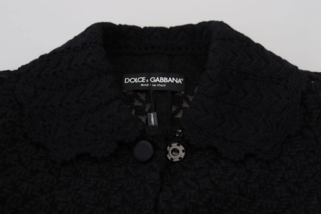 Blazer long noir en coton Dolce & Gabbana avec boutons, élégant et classique, porté sur un mannequin.