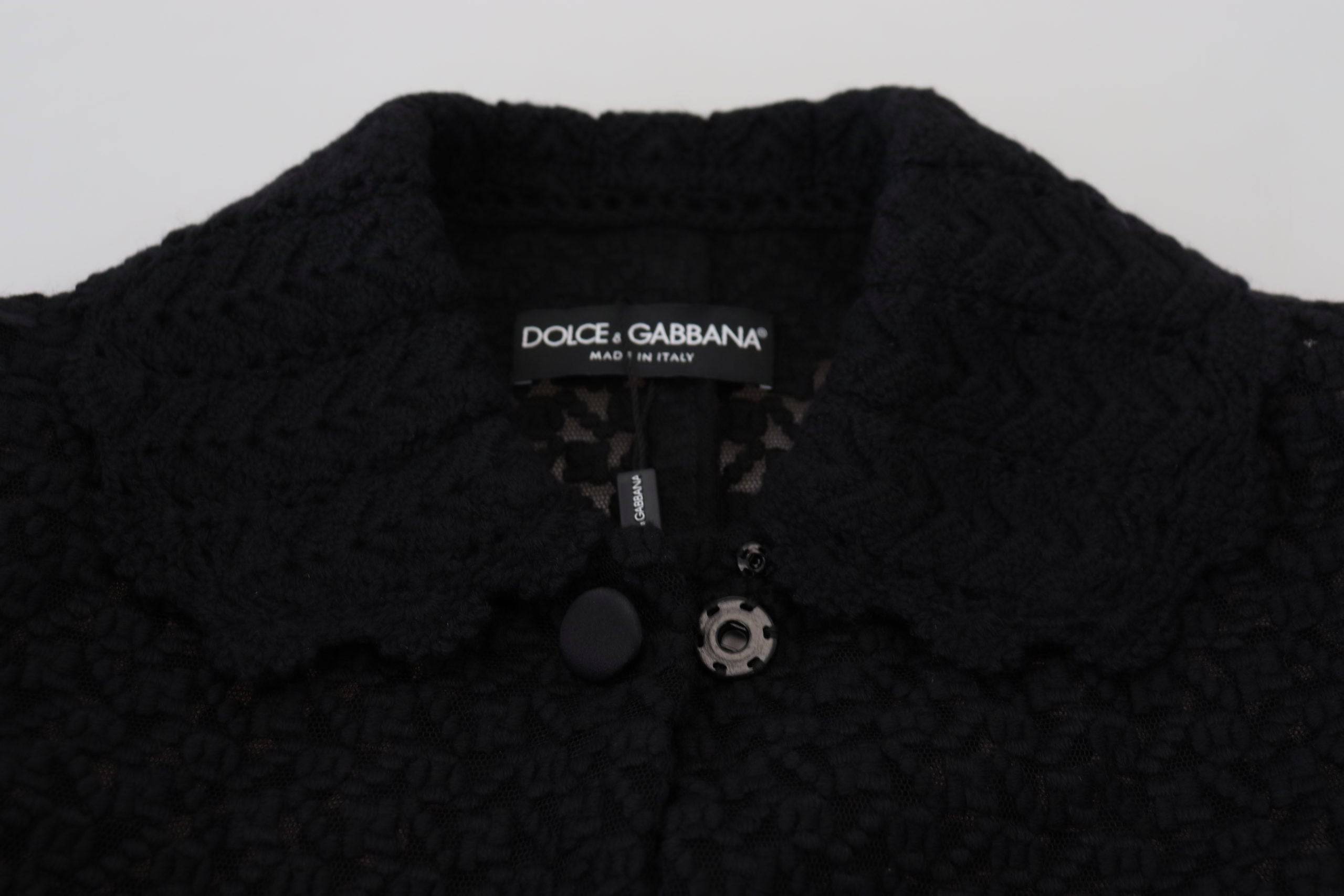 Blazer long noir en coton Dolce & Gabbana avec boutons, élégant et classique, porté sur un mannequin.
