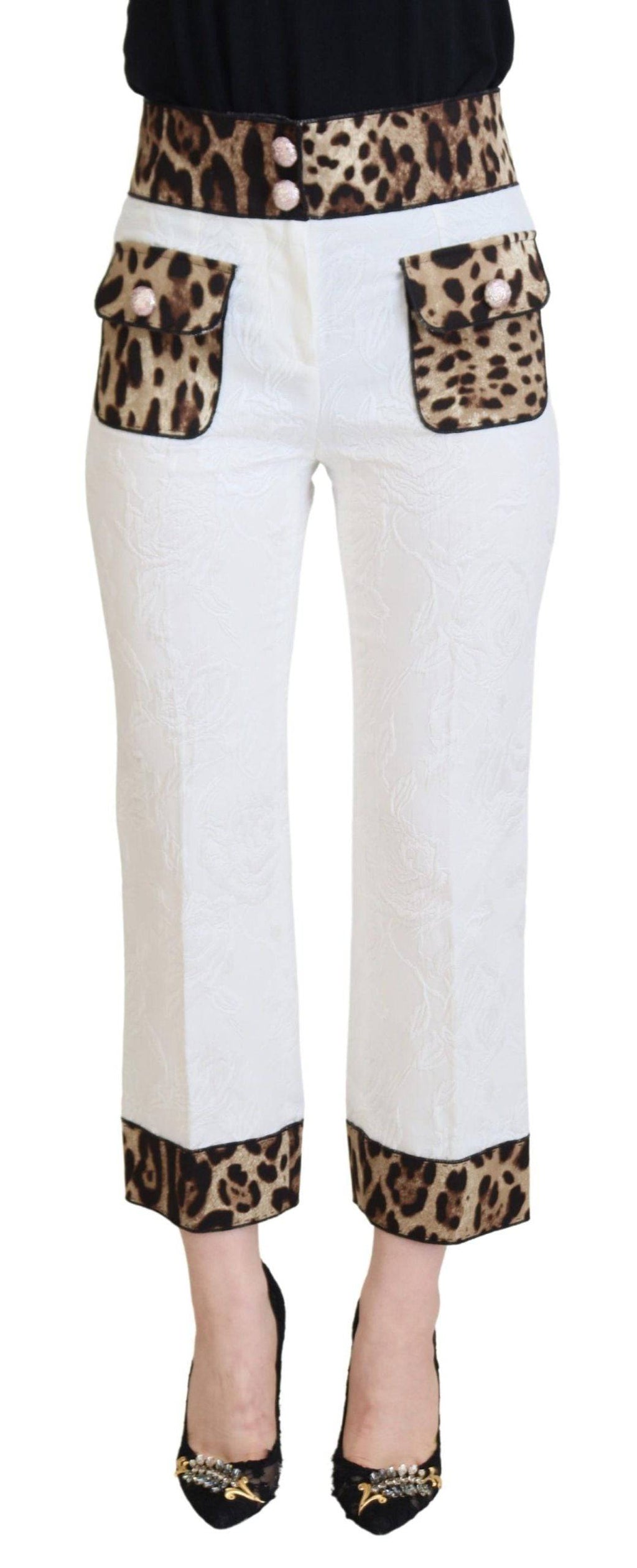 Pantalons Dolce & Gabbana à taille haute en coton blanc avec motif léopard, mode chic et tendance pour femmes.