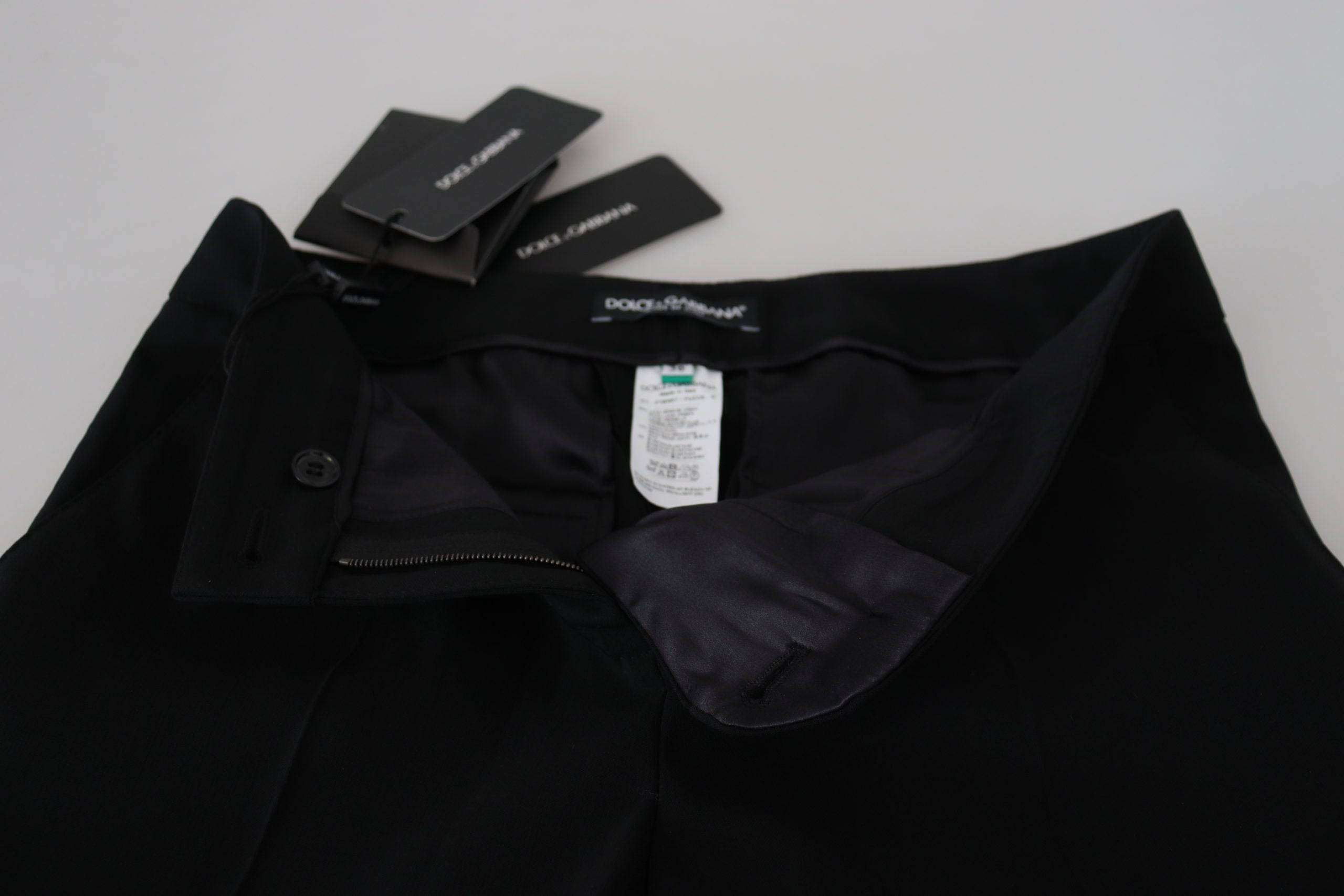 Pantalon noir taille haute pour femmes de Dolce & Gabbana, coupe élégante et moderne, en tissu fluide.